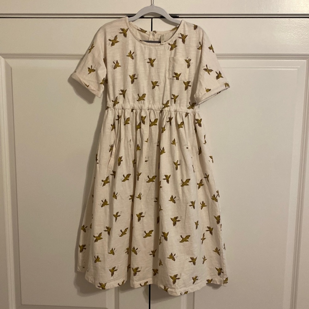 Boutique dress with bird pattern